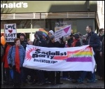 Brighton Socialist Party members taking part in a Birhgton LGBT solidarity protest on the opening day of the 2014 winter Olympics, photo Serena Cheung