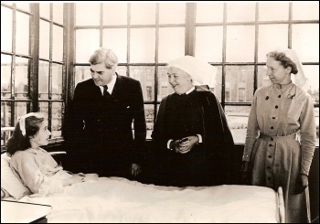 Health minister Aneurin Bevan with workers and a patient on the first day of the NHS, photo University of Liverpool Faculty of Health & Life Sciences/CC