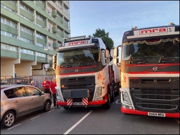Lorries attempting to drop off shipping containers in the car park. Photo: Nancy Taaffe