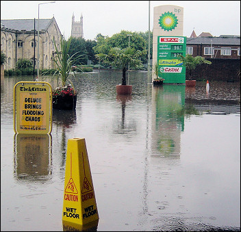 Caution wet floor - flooding in the centre of Gloucester, photo Chris Moore